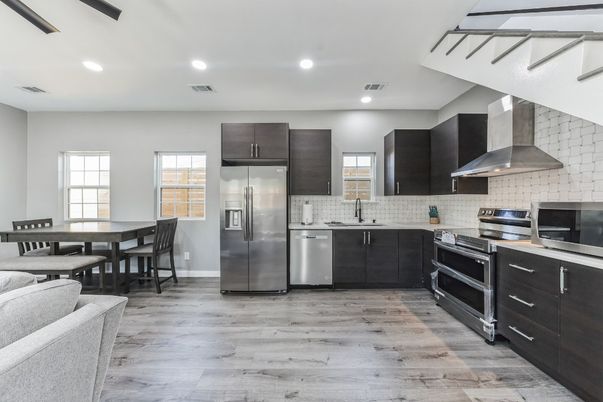 Dining room, Interior, Kitchen, Recessed Lighting, Stainless Steel Appliances, Wood Texture Flooring