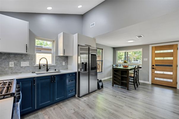 Dining room, Interior, Kitchen, Recessed Lighting, Stainless Steel Appliances, Wood Texture Flooring