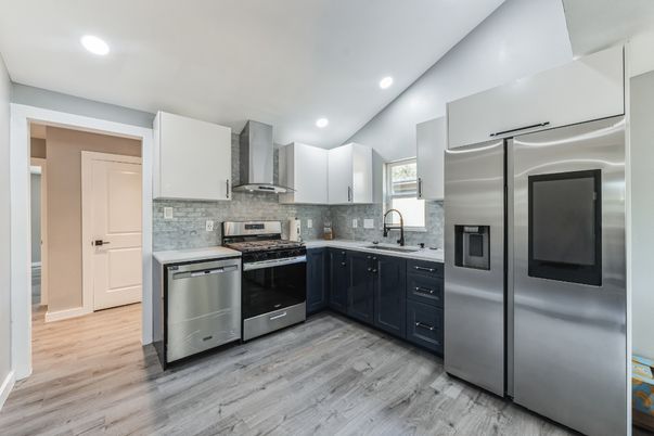 Interior, Kitchen, Recessed Lighting, Stainless Steel Appliances, Wood Texture Flooring