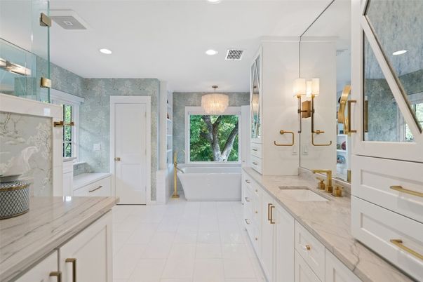 Bathroom, Chandelier, Dual Sink Vanities, Free Standing Baths, Glass Shower, Interior, Marble Walls, Recessed Lighting