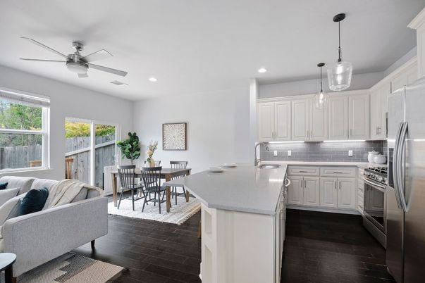 Dining room, Interior, Kitchen, Pendant Lights, Recessed Lighting, Stainless Steel Appliances, Wood Texture Flooring