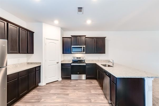 Interior, Kitchen, Recessed Lighting, Stainless Steel Appliances, Wood Texture Flooring