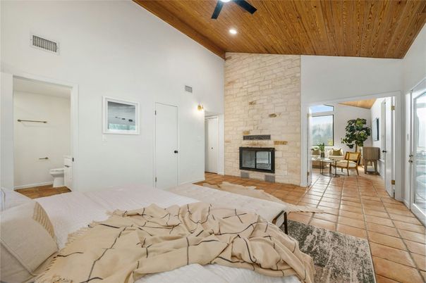 Bathroom, Fireplace, Interior, Living room, Recessed Lighting, Stone Walls, Wooden Ceilings
