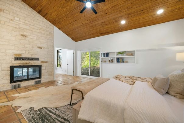 Bedroom, Fireplace, Interior, Recessed Lighting, Stone Walls, Wooden Ceilings