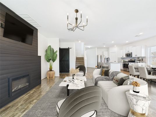 Chandelier, Dining room, Fireplace, Interior, Kitchen, Living room, Recessed Lighting, Stainless Steel Appliances, Wood Texture Flooring