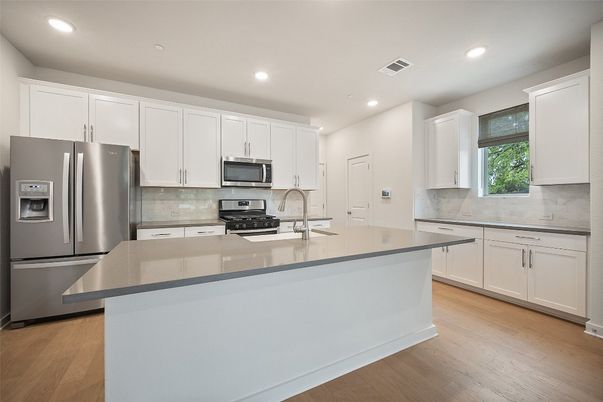 Interior, Kitchen, Recessed Lighting, Stainless Steel Appliances, Wood Texture Flooring