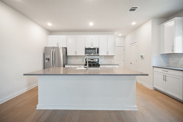 Interior, Kitchen, Recessed Lighting, Stainless Steel Appliances, Wood Texture Flooring