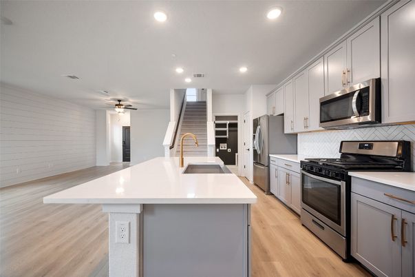 Interior, Kitchen, Recessed Lighting, Stainless Steel Appliances, Wood Texture Flooring