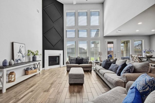 Dining room, Fireplace, Interior, Living room, Recessed Lighting, Wood Texture Flooring