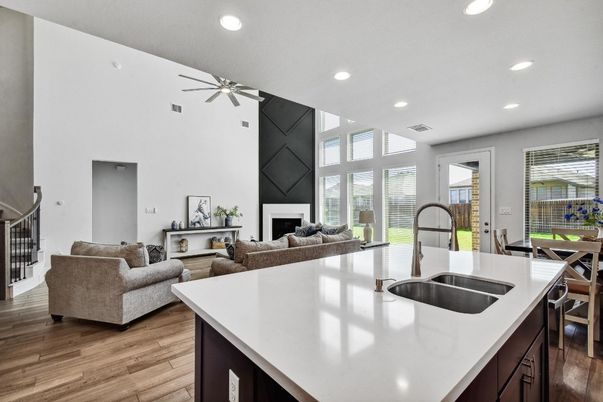 Fireplace, Interior, Kitchen, Living room, Recessed Lighting, Wood Texture Flooring
