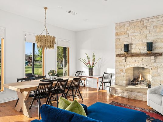 Dining room, Fireplace, Interior, Pendant Lights, Stone Walls, Wood Texture Flooring