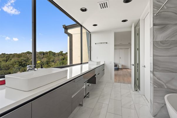 Bathroom, Dual Sink Vanities, Free Standing Baths, Interior, Marble, Recessed Lighting, Wood Texture Flooring