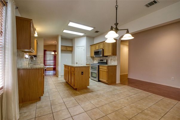 Interior, Kitchen, Pendant Lights, Stainless Steel Appliances, Wood Texture Flooring