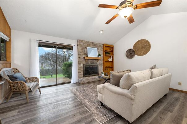 Fireplace, Interior, Living room, Recessed Lighting, Stone Walls, Wood Texture Flooring