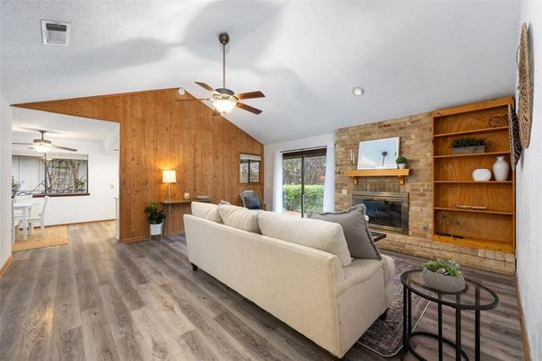 Fireplace, Interior, Living room, Recessed Lighting, Stone Walls, Wood Texture Flooring, Wooden Walls