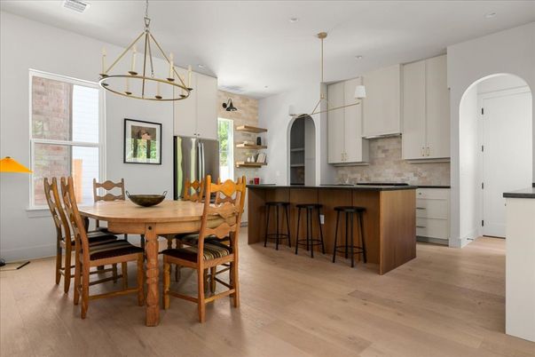 Chandelier, Dining room, Interior, Kitchen, Pendant Lights, Recessed Lighting, Stainless Steel Appliances, Wood Texture Flooring