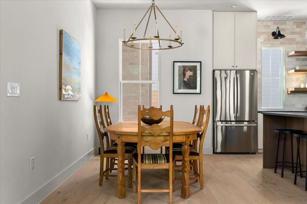 Dining room, Interior, Kitchen, Pendant Lights, Recessed Lighting, Stainless Steel Appliances, Wood Texture Flooring