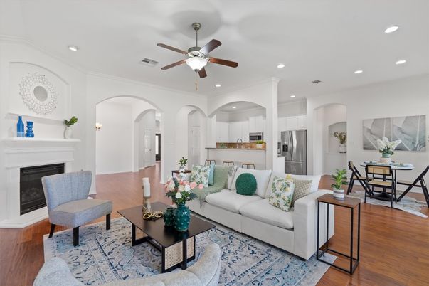 Dining room, Fireplace, Interior, Kitchen, Living room, Recessed Lighting, Stainless Steel Appliances, Wood Texture Flooring