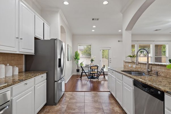 Dining room, Interior, Kitchen, Recessed Lighting, Stainless Steel Appliances, Wood Texture Flooring