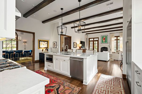 Fireplace, Interior, Kitchen, Living room, Pendant Lights, Recessed Lighting, Stainless Steel Appliances, Wooden Beams, Wood Texture Flooring