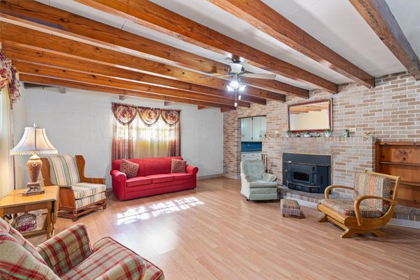 Fireplace, Interior, Living room, Stone Walls, Wooden Beams, Wood Texture Flooring