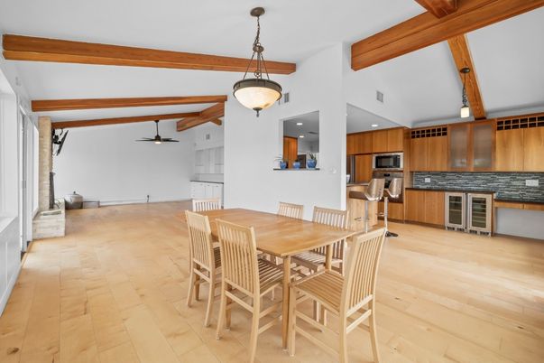 Dining room, Interior, Kitchen, Pendant Lights, Recessed Lighting, Stainless Steel Appliances, Wooden Beams, Wood Texture Flooring