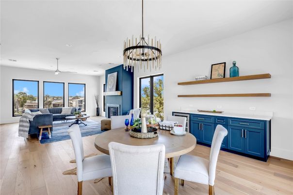 Dining room, Fireplace, Interior, Living room, Pendant Lights, Recessed Lighting, Wood Texture Flooring