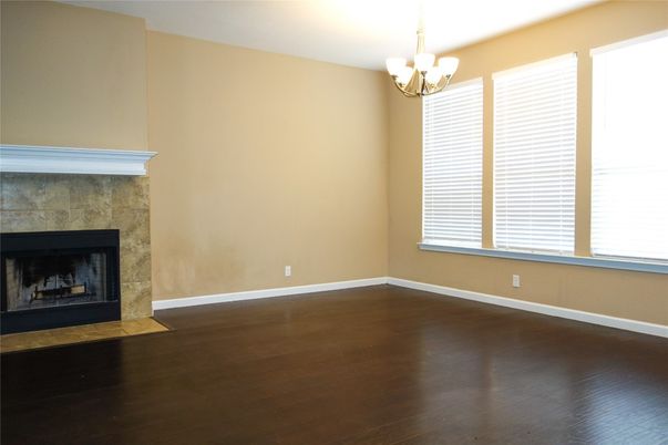 Chandelier, Empty room, Fireplace, Interior, Wood Texture Flooring