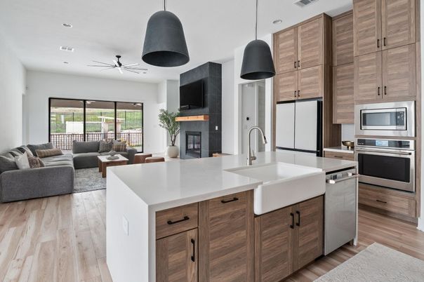 Fireplace, Interior, Kitchen, Living room, Pendant Lights, Recessed Lighting, Stainless Steel Appliances, Wood Texture Flooring