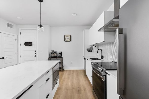 Interior, Kitchen, Pendant Lights, Recessed Lighting, Stainless Steel Appliances, Wood Texture Flooring