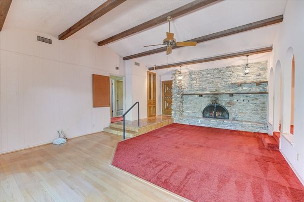 Chandelier, Empty room, Fireplace, Interior, Stone Walls, Wooden Beams, Wood Texture Flooring