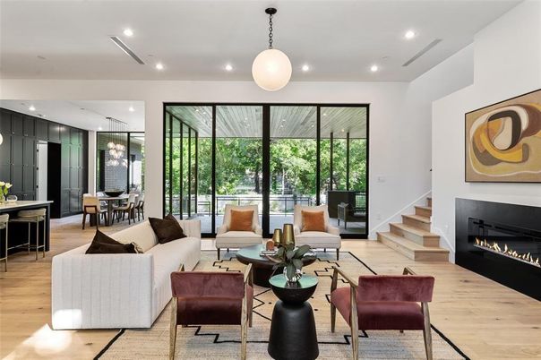 Dining room, Fireplace, Interior, Living room, Pendant Lights, Recessed Lighting, Wood Texture Flooring