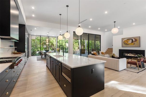 Dining room, Fireplace, Interior, Kitchen, Living room, Pendant Lights, Recessed Lighting, Stainless Steel Appliances, Wood Texture Flooring