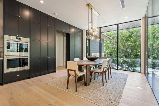 Dining room, Interior, Kitchen, Pendant Lights, Recessed Lighting, Stainless Steel Appliances, Wood Texture Flooring