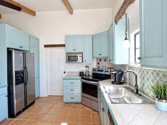 Interior, Kitchen, Pendant Lights, Stainless Steel Appliances, Tile Countertops, Wooden Beams