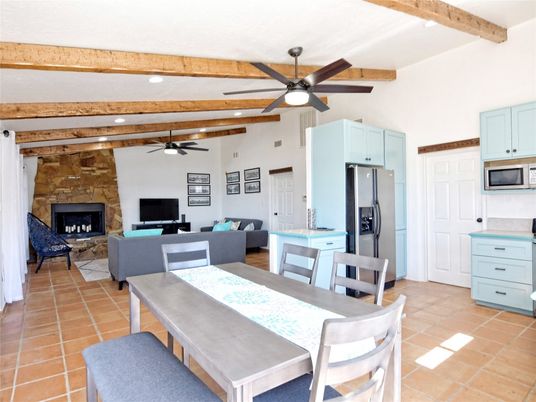 Dining room, Fireplace, Interior, Kitchen, Living room, Recessed Lighting, Stone Walls, Wooden Beams