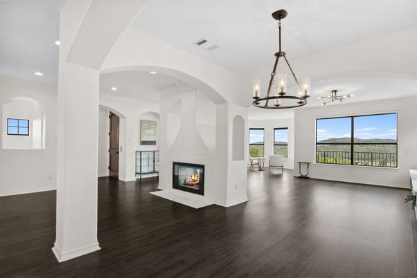 Chandelier, Empty room, Fireplace, Interior, Pendant Lights, Recessed Lighting, Wood Texture Flooring