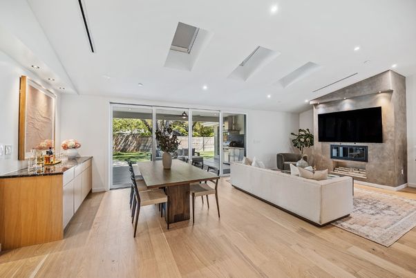 Dining room, Fireplace, Interior, Living room, Recessed Lighting, Wood Texture Flooring