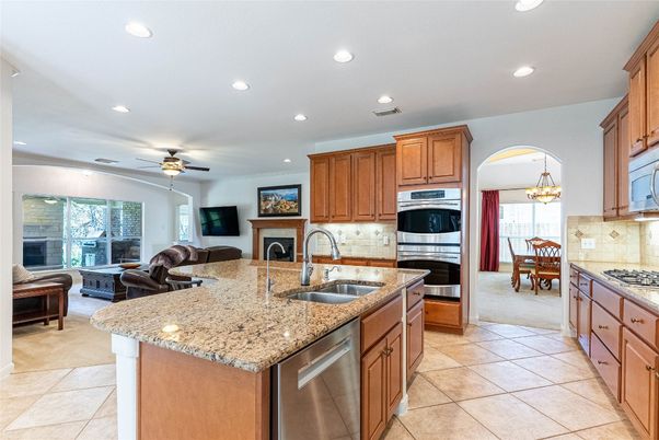 Dining room, Fireplace, Interior, Kitchen, Recessed Lighting, Stainless Steel Appliances