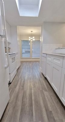Interior, Kitchen, Pendant Lights, Washer, Wood Texture Flooring