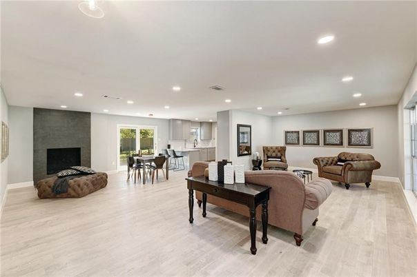 Dining room, Fireplace, Interior, Kitchen, Living room, Recessed Lighting, Wood Texture Flooring