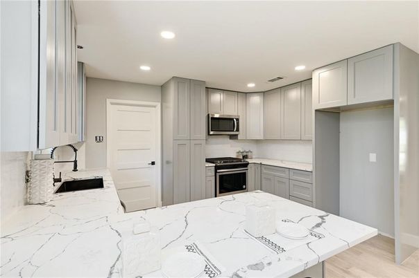 Interior, Kitchen, Recessed Lighting, Stainless Steel Appliances, Wood Texture Flooring