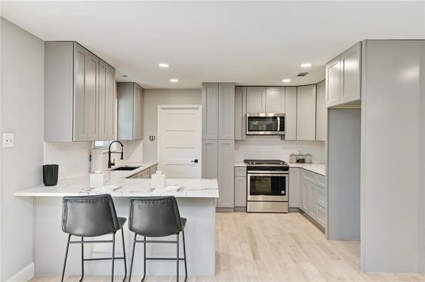 Interior, Kitchen, Recessed Lighting, Stainless Steel Appliances, Wood Texture Flooring