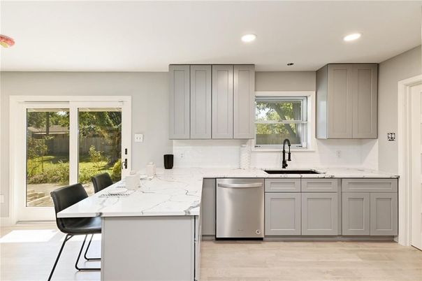 Dining room, Interior, Kitchen, Recessed Lighting, Stainless Steel Appliances, Wood Texture Flooring
