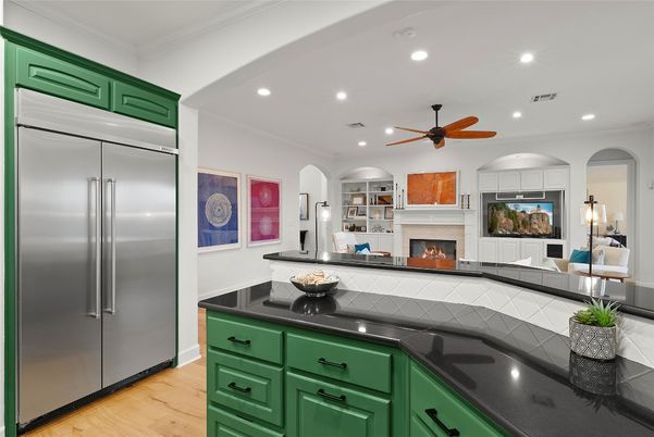 Fireplace, Interior, Kitchen, Recessed Lighting, Stainless Steel Appliances, Wood Texture Flooring