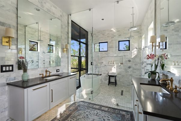 Bathroom, Dual Sink Vanities, Free Standing Baths, Glass Shower, Interior, Marble Walls, Pendant Lights, Stone Walls
