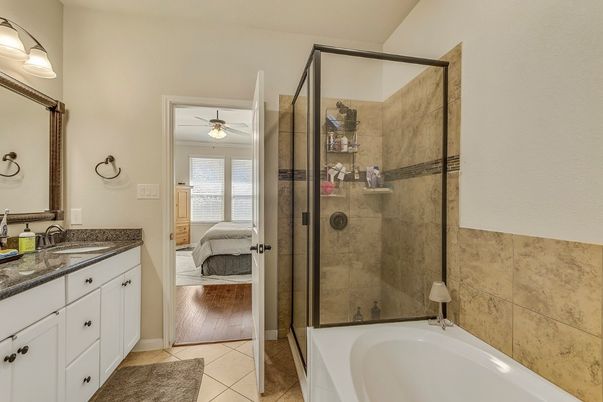Bathroom, Bedroom, Dual Sink Vanities, Glass Shower, Interior, Wood Texture Flooring