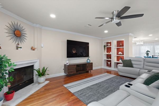 Dining room, Fireplace, Interior, Living room, Recessed Lighting, Wood Texture Flooring