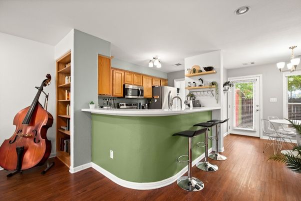 Chandelier, Dining room, Interior, Kitchen, Recessed Lighting, Stainless Steel Appliances, Wood Texture Flooring