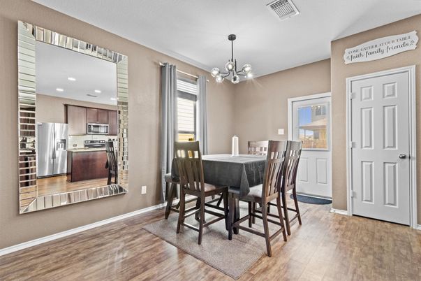 Dining room, Interior, Kitchen, Pendant Lights, Recessed Lighting, Stainless Steel Appliances, Wood Texture Flooring